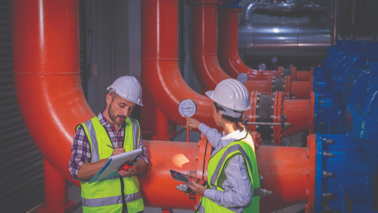 Engineer calculating cooling loads